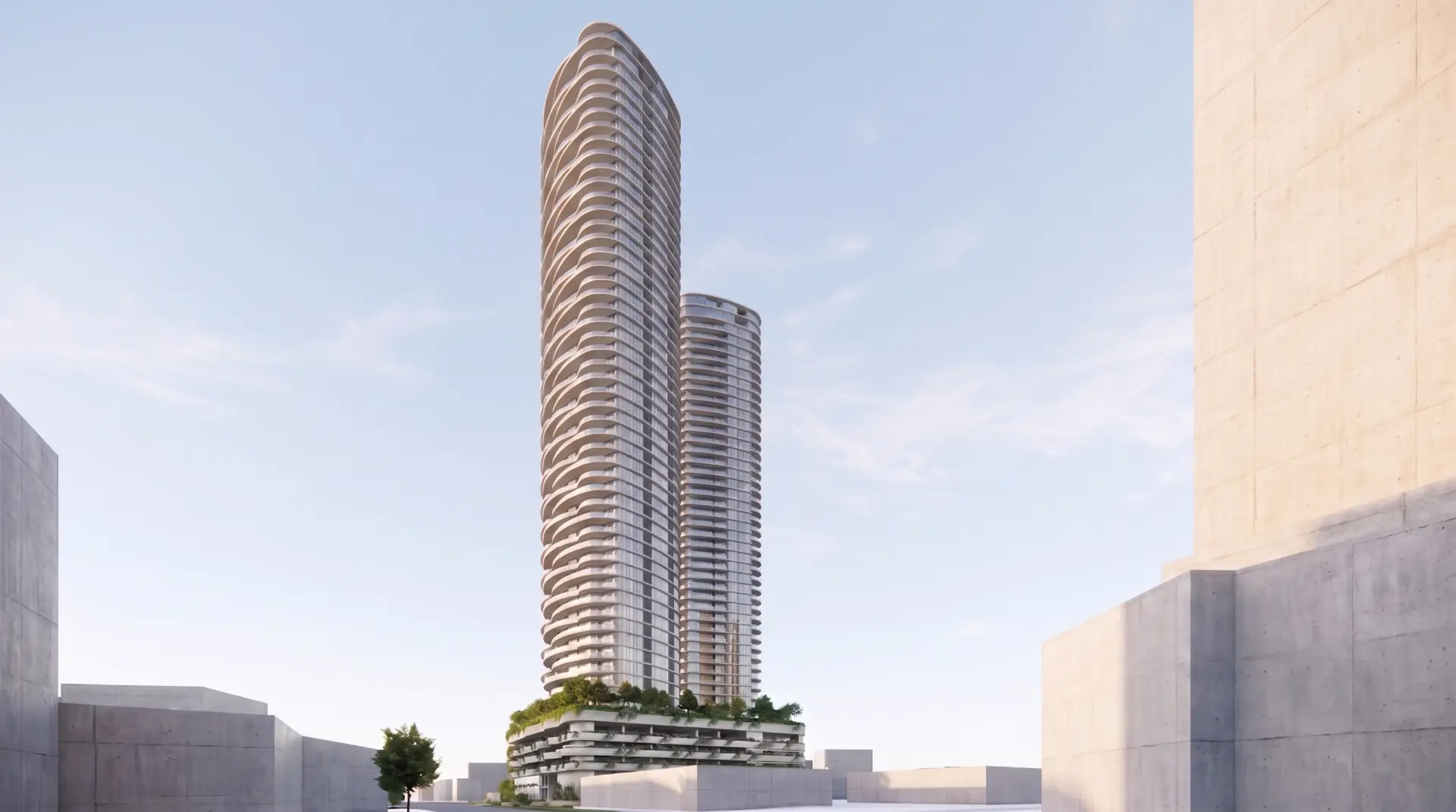 Sculptural twin residential towers rising above a landscaped podium